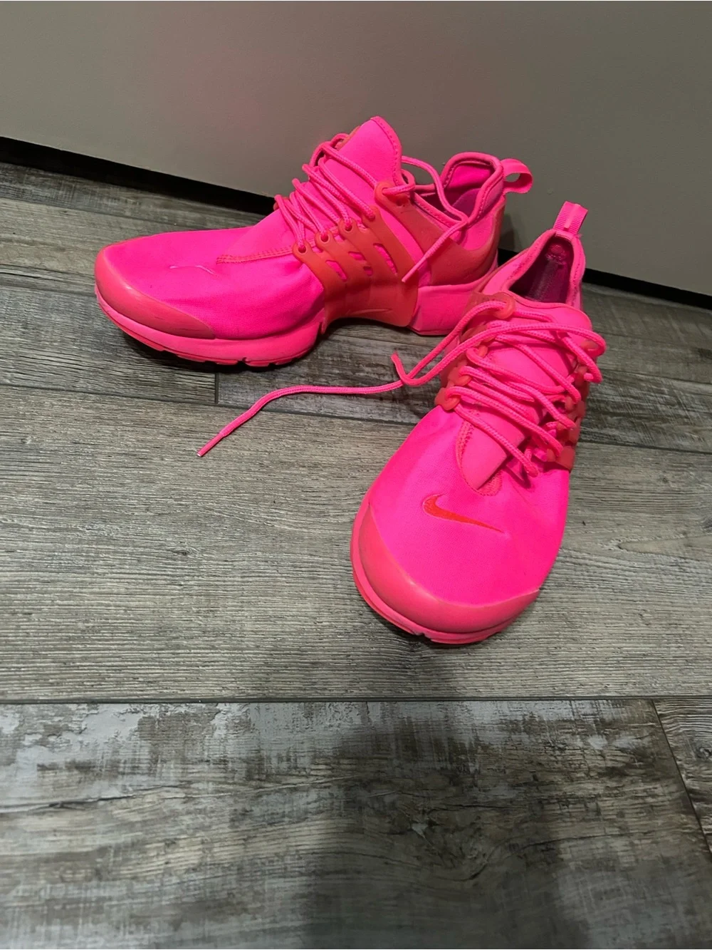 Nike Air Presto sneakers in a vibrant hyper bright hit pink colorway